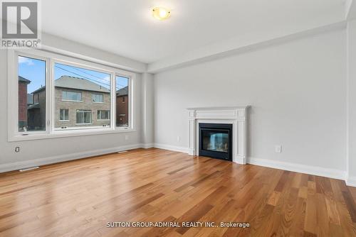 32 Mckay Avenue, Kawartha Lakes, ON - Indoor Photo Showing Living Room With Fireplace