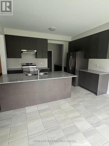 33 Rustic Oak Trail, North Dumfries, ON - Indoor Photo Showing Kitchen With Double Sink