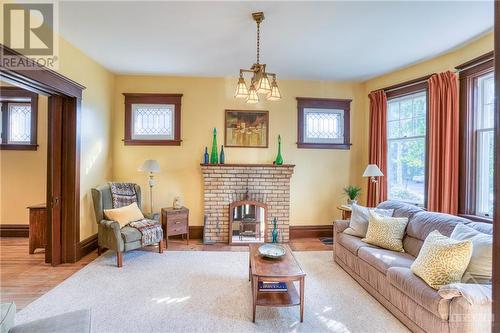 19 Mary Street, Perth, ON - Indoor Photo Showing Living Room With Fireplace