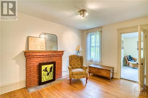 19 Mary Street, Perth, ON - Indoor Photo Showing Other Room With Fireplace