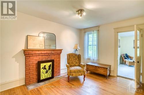 19 Mary Street, Perth, ON - Indoor Photo Showing Other Room With Fireplace