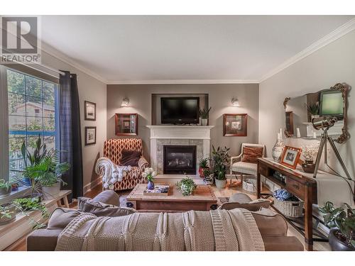 512 Wildwood  Drive, Cranbrook, BC - Indoor Photo Showing Living Room With Fireplace