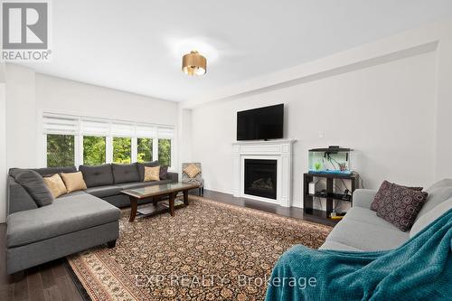 1739 Emberton Way, Innisfil, ON - Indoor Photo Showing Living Room With Fireplace