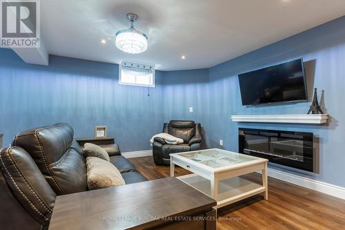 71 Newport Lane, Norfolk (Port Dover), ON - Indoor Photo Showing Living Room With Fireplace