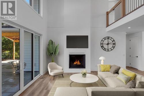 2070 Fisher Road, Kelowna, BC - Indoor Photo Showing Living Room With Fireplace