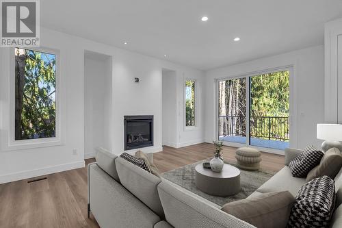 2070 Fisher Road, Kelowna, BC - Indoor Photo Showing Living Room With Fireplace