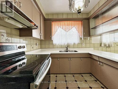 39 Elmvale Crescent, Toronto (West Humber-Clairville), ON - Indoor Photo Showing Kitchen With Double Sink