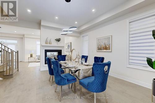 14 Settlers Road E, Oakville, ON - Indoor Photo Showing Dining Room With Fireplace