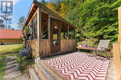 Side door to the Bunkie - 6960 511 Highway, Lanark Highlands, ON - Outdoor With Deck Patio Veranda