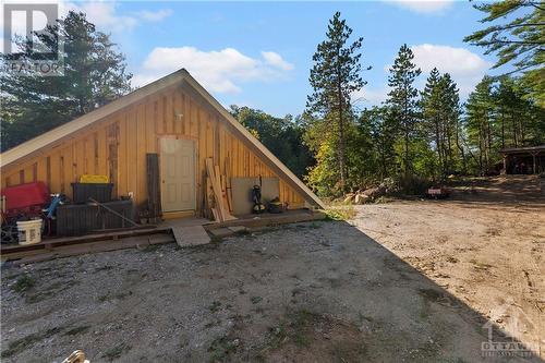 Back of the garage and entrance to the workshop - 6960 511 Highway, Lanark Highlands, ON - Outdoor