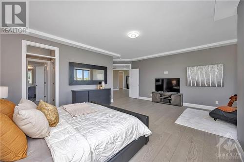 Primary Bedroom with Dual Closets and luxury ensuite - 556 Shoreway Drive, Ottawa, ON - Indoor Photo Showing Bedroom