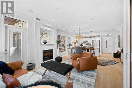 2901 Abbott Street Unit# 220, Kelowna, BC - Indoor Photo Showing Living Room With Fireplace