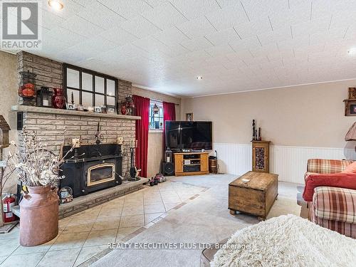 936125 Airport Road N, Mulmur, ON - Indoor Photo Showing Living Room With Fireplace