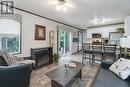 253 - 8845 Lundy'S Lane, Niagara Falls, ON  - Indoor Photo Showing Living Room With Fireplace 