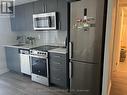 104 - 38 Monte Kwinter Court, Toronto (Clanton Park), ON  - Indoor Photo Showing Kitchen With Upgraded Kitchen 