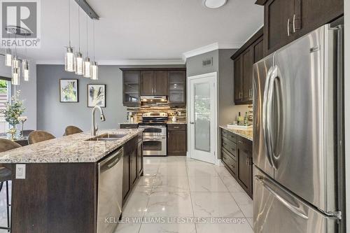 2077 Springridge Drive, London, ON - Indoor Photo Showing Kitchen With Stainless Steel Kitchen With Double Sink With Upgraded Kitchen