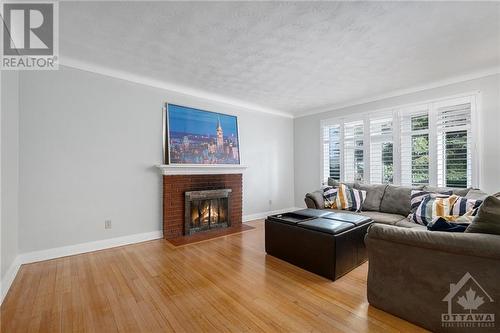 28 Roundhay Drive, Ottawa, ON - Indoor Photo Showing Living Room With Fireplace