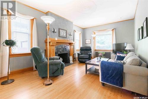 1140 Garnet Street, Regina, SK - Indoor Photo Showing Living Room With Fireplace