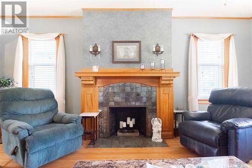 1140 Garnet Street, Regina, SK - Indoor Photo Showing Living Room With Fireplace