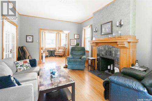 1140 Garnet Street, Regina, SK - Indoor Photo Showing Living Room With Fireplace