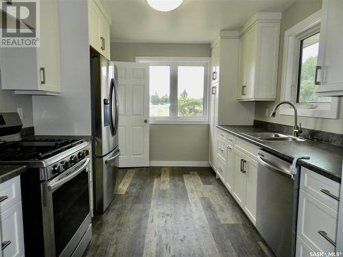 873 4Th Avenue Ne, Moose Jaw, SK - Indoor Photo Showing Kitchen With Double Sink