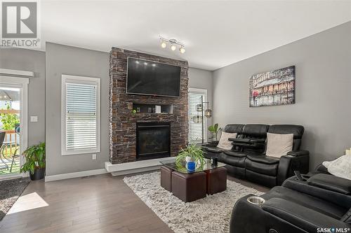 442 Secord Way, Saskatoon, SK - Indoor Photo Showing Living Room With Fireplace