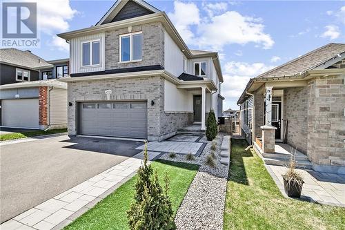 Street View, private covered, recessed front entry - 4530 Kelly Farm Drive, Ottawa, ON - Outdoor With Facade