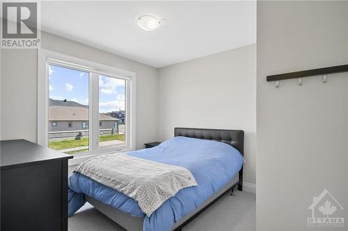 Bedroom 4 - 4530 Kelly Farm Drive, Ottawa, ON - Indoor Photo Showing Bedroom