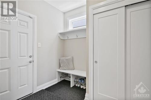 Mudroom with entry from garage and into the kitchen - 4530 Kelly Farm Drive, Ottawa, ON - Indoor Photo Showing Other Room