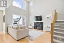 4530 Kelly Farm Drive, Ottawa, ON  - Indoor Photo Showing Living Room With Fireplace 