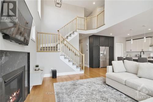 4530 Kelly Farm Drive, Ottawa, ON - Indoor Photo Showing Living Room With Fireplace