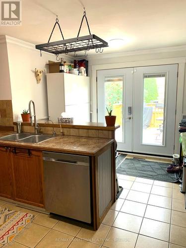 13 Robertson Road, Essa, ON - Indoor Photo Showing Kitchen With Double Sink