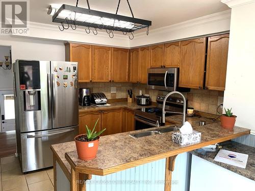 13 Robertson Road, Essa, ON - Indoor Photo Showing Kitchen With Double Sink