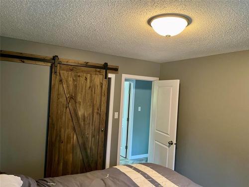 105 Elviss Crescent, Brandon, MB - Indoor Photo Showing Bedroom