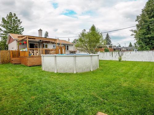 Cour - 4100 Rue Barbeau, Longueuil (Saint-Hubert), QC - Outdoor With Above Ground Pool With Backyard