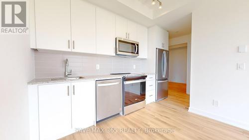 514 - 335 Wheat Boom Drive, Oakville, ON - Indoor Photo Showing Kitchen With Stainless Steel Kitchen