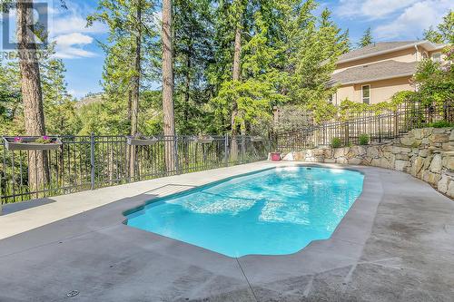 251 Highgate Court, Kelowna, BC - Outdoor With In Ground Pool With Deck Patio Veranda