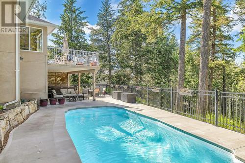 251 Highgate Court, Kelowna, BC - Outdoor With In Ground Pool With Deck Patio Veranda