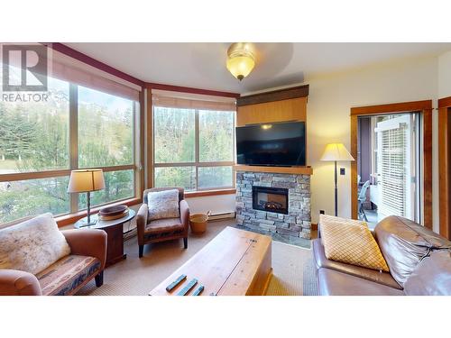 4559 Timberline Crescent Unit# 637 C & D, Fernie, BC - Indoor Photo Showing Living Room With Fireplace