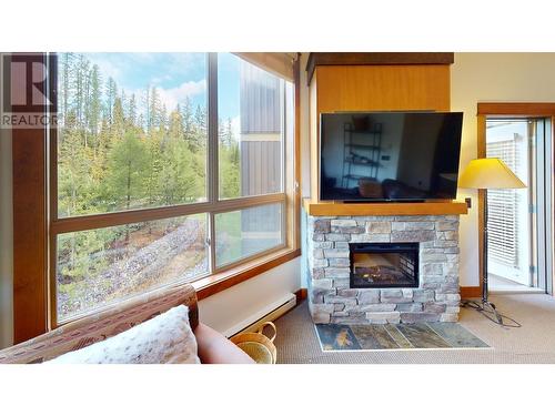 4559 Timberline Crescent Unit# 637 C & D, Fernie, BC - Indoor Photo Showing Living Room With Fireplace