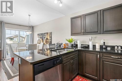 205 100 Chaparral Boulevard, Martensville, SK - Indoor Photo Showing Kitchen With Double Sink