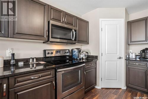 205 100 Chaparral Boulevard, Martensville, SK - Indoor Photo Showing Kitchen With Stainless Steel Kitchen