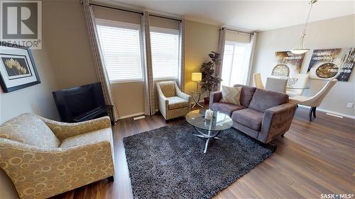 205 100 Chaparral Boulevard, Martensville, SK - Indoor Photo Showing Living Room