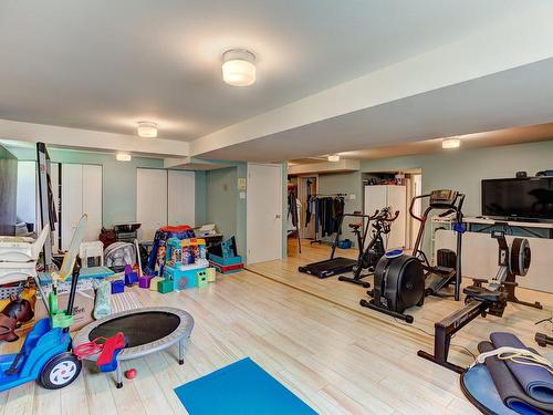 Playroom - 108 Rue Marie-Curie, Dollard-Des-Ormeaux, QC - Indoor Photo Showing Gym Room