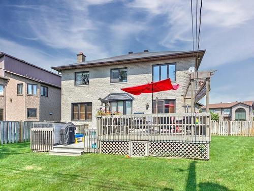 Backyard - 108 Rue Marie-Curie, Dollard-Des-Ormeaux, QC - Outdoor With Deck Patio Veranda With Exterior