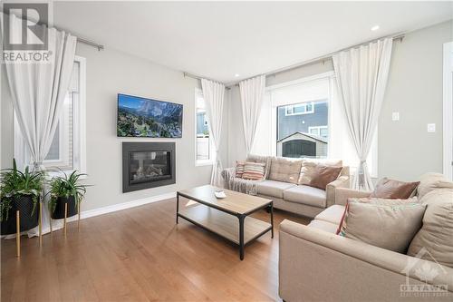 34 Coppermine Street, Ottawa, ON - Indoor Photo Showing Living Room With Fireplace