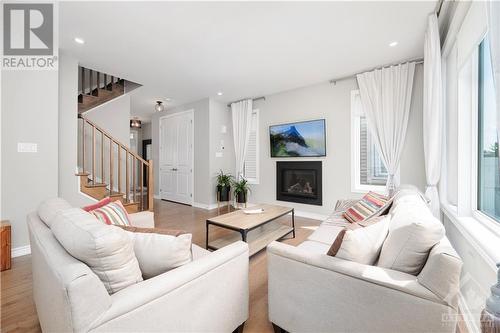 34 Coppermine Street, Ottawa, ON - Indoor Photo Showing Living Room With Fireplace