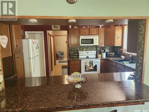 100 Scott Street, Kennedy, SK - Indoor Photo Showing Kitchen With Double Sink