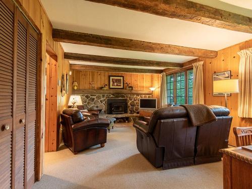 Salle familiale - 527 Rue Des Trembles, Mont-Tremblant, QC - Indoor Photo Showing Living Room With Fireplace