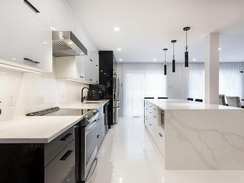 Kitchen - 4883 Rue Olivier-Maurault, Laval (Chomedey), QC - Indoor Photo Showing Kitchen With Upgraded Kitchen